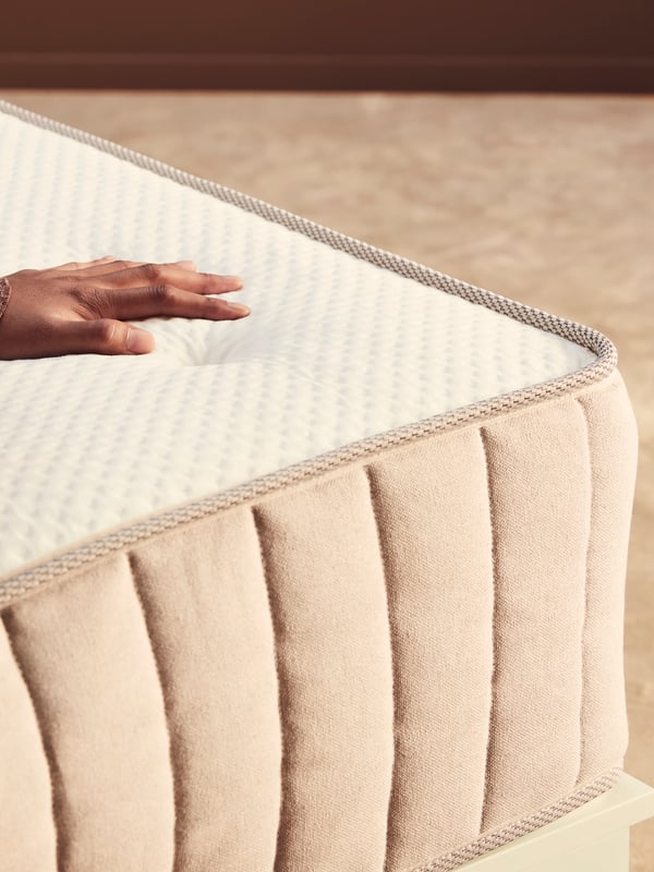 A firm/natural VATNESTRÖM pocket sprung mattress