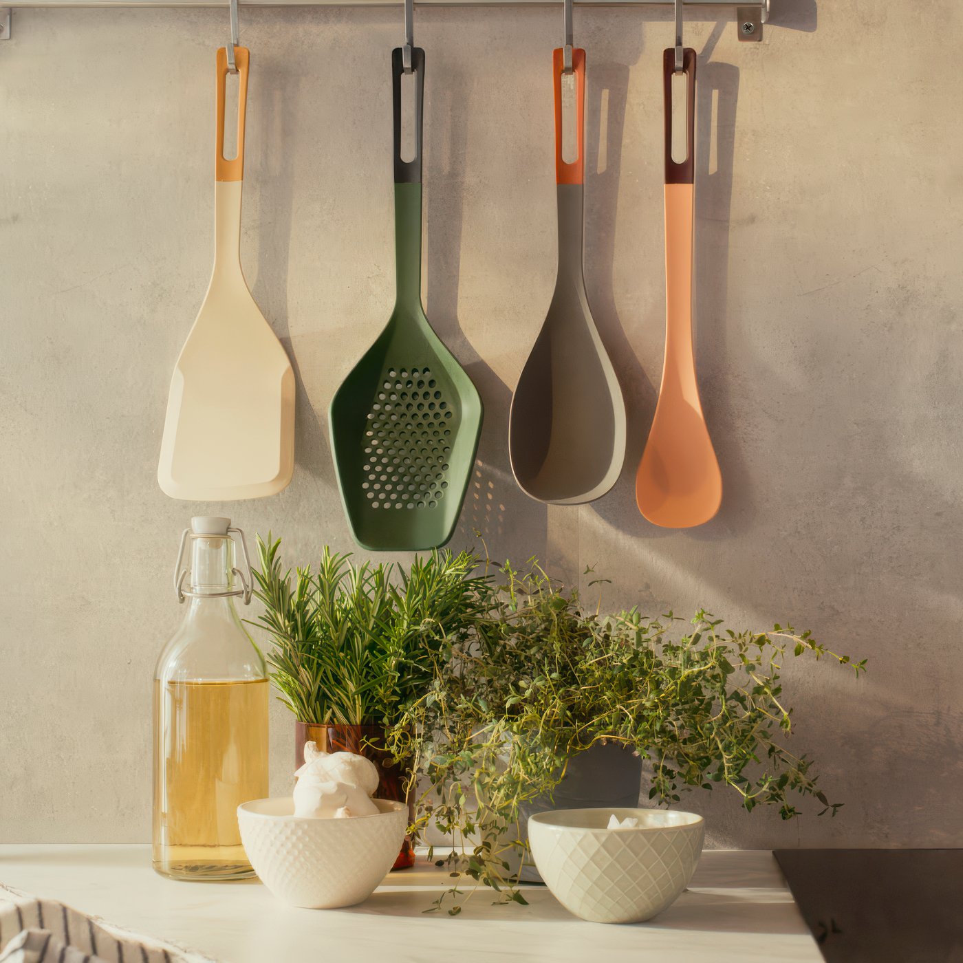 A light orange/dark red KNORRHANE spoon for cooking in the kitchen ready for Deepavali celebrations