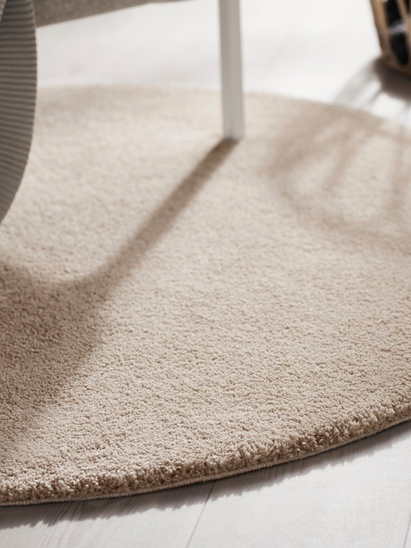 An off-white STOENSE rug, low pile in the NA
