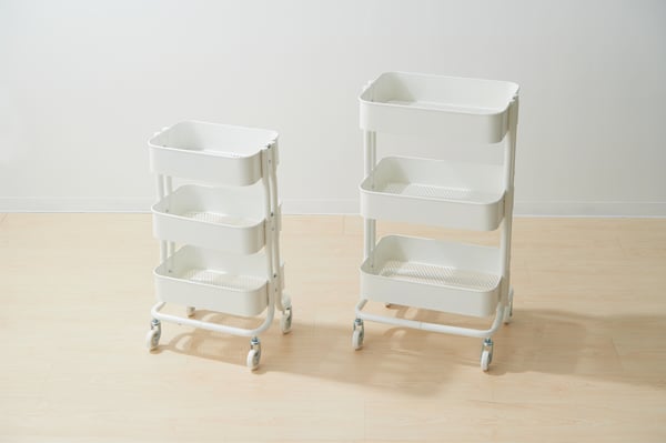 A white RÅSKOG trolley