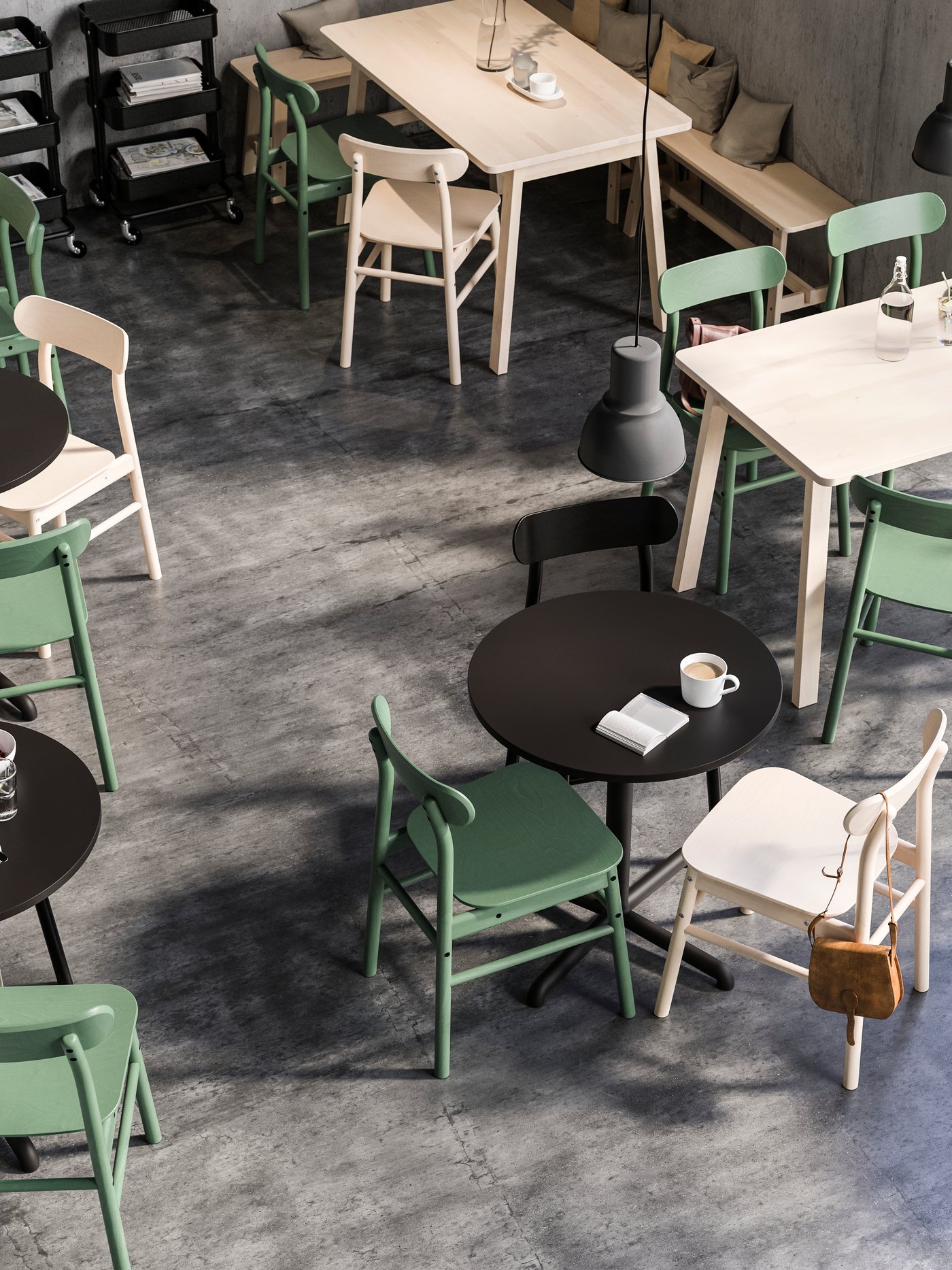 A black RÅSKOG trolley in the dining room