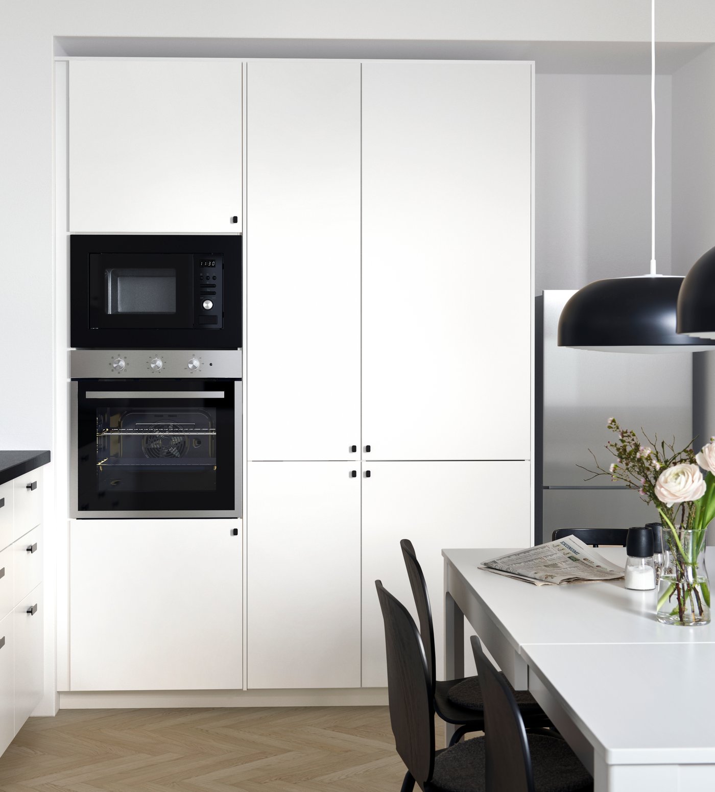 An IKEA 300 black VÄRMD microwave oven in the kitchen