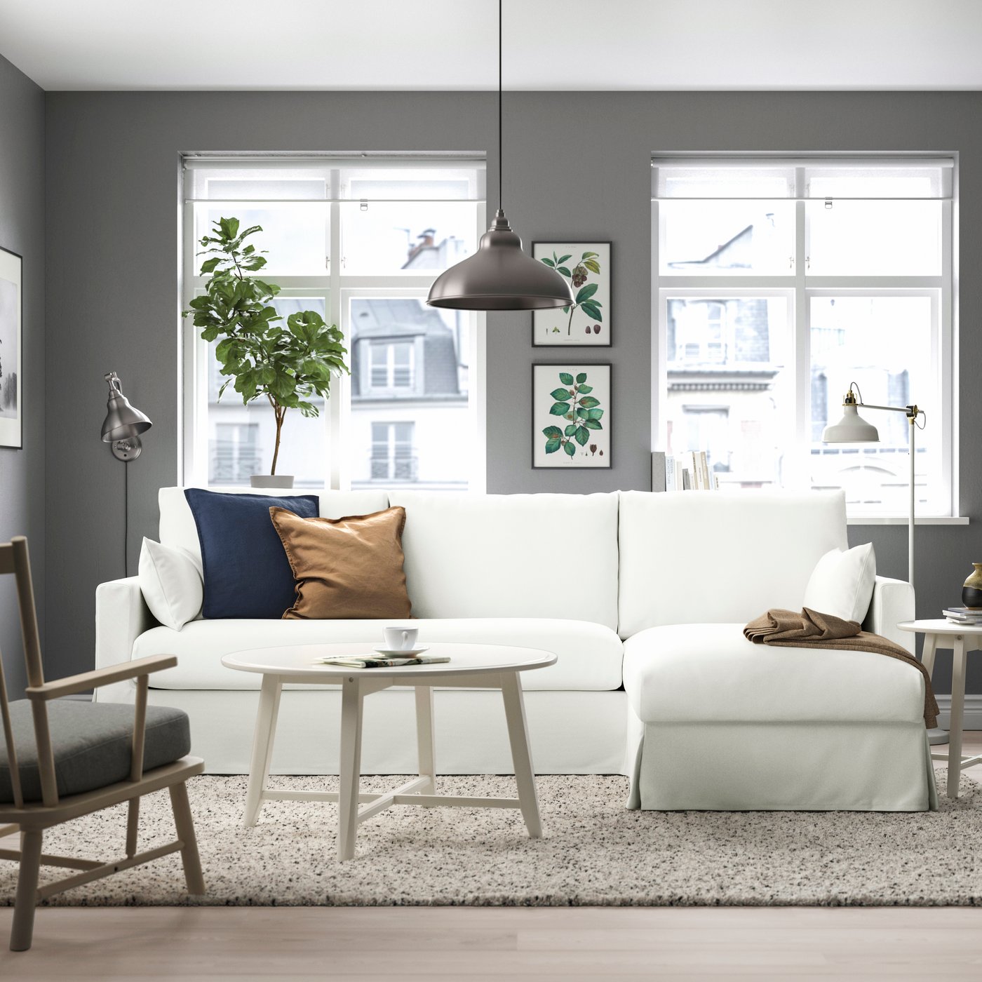 A Hallarp white HYLTARP 3-seat sofa w chaise longue, right in the living room