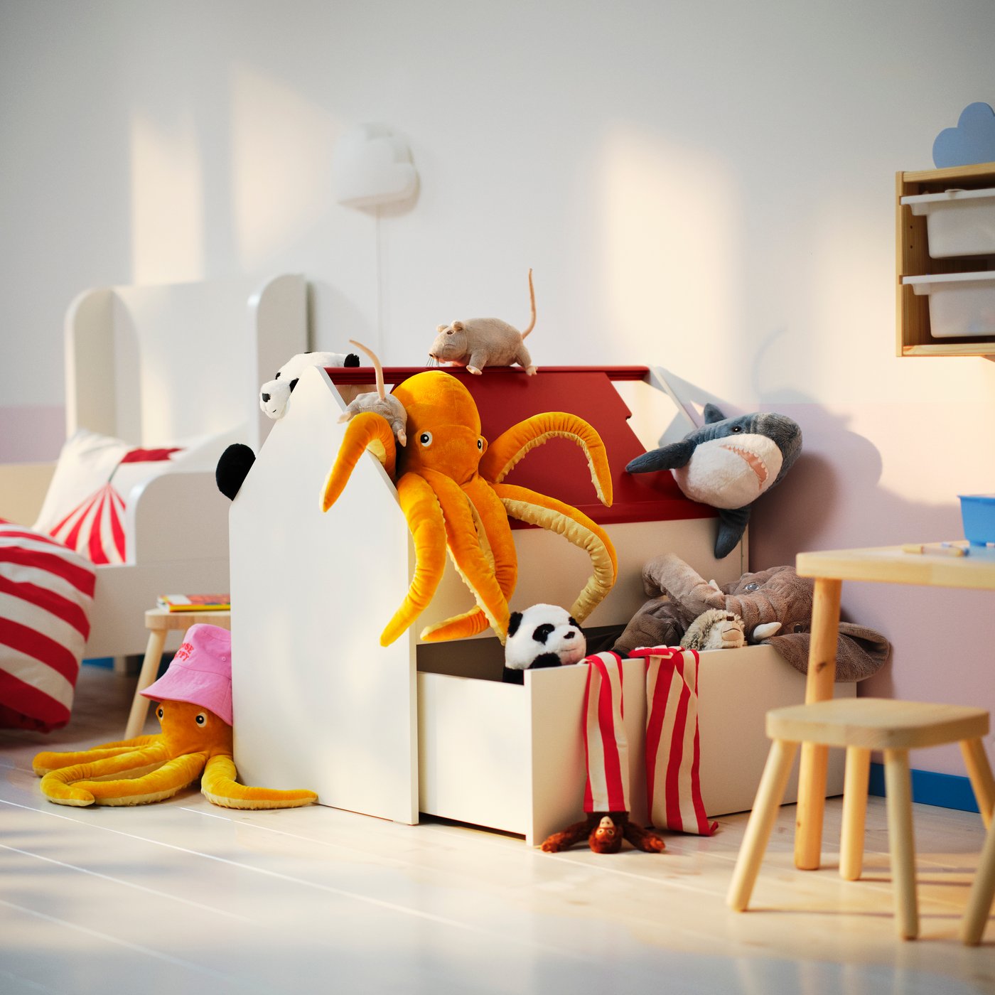 A white/red VITBJÖRN storage unit with drawer