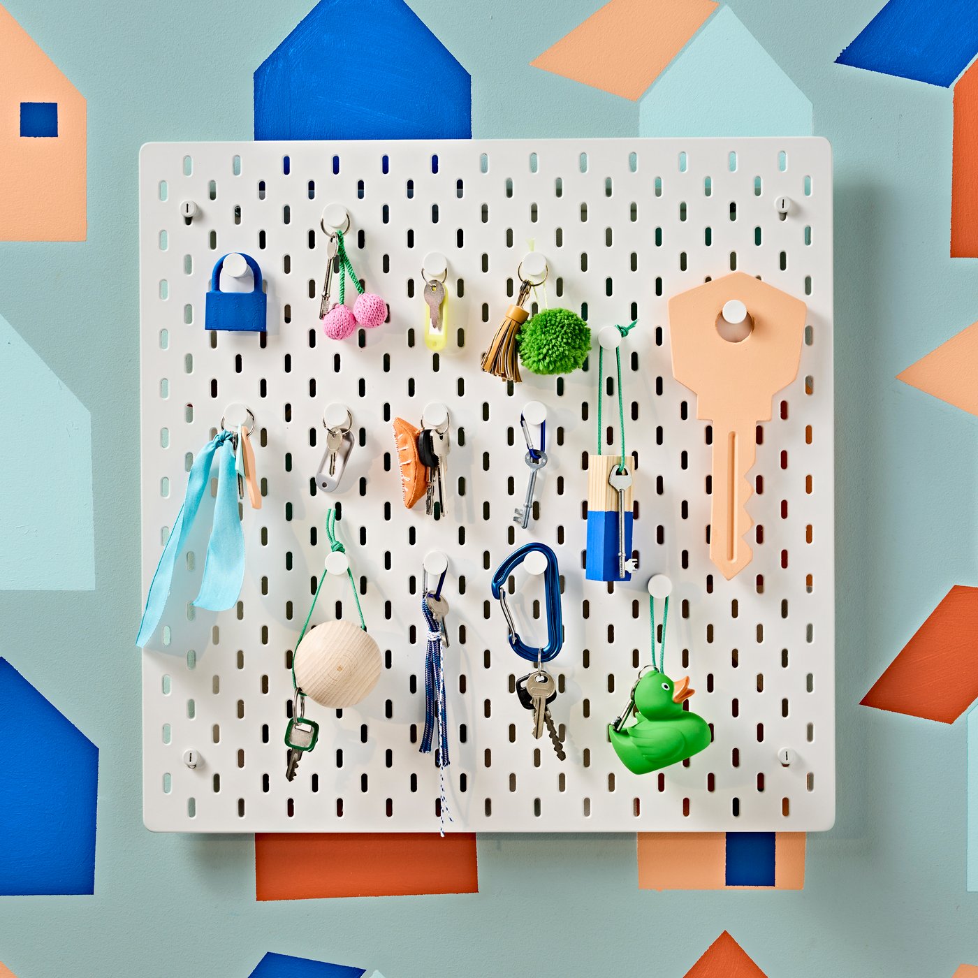 A white SKÅDIS pegboard in the NA