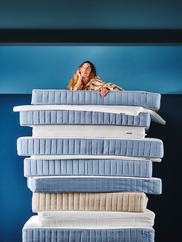 A white NISSEHOLM mattress pad