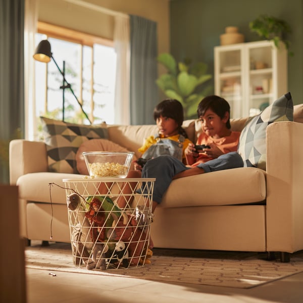 A white KVISTBRO storage table in the living room