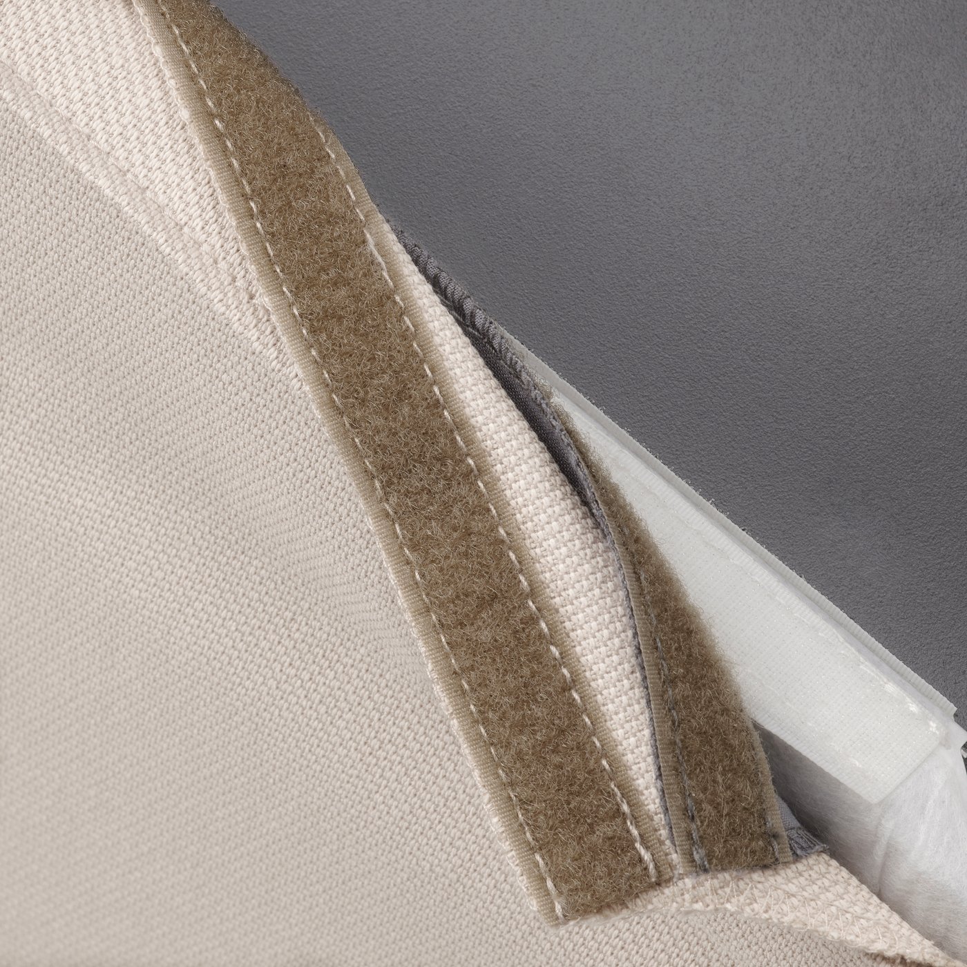 A beige BERGMUND chair cover.