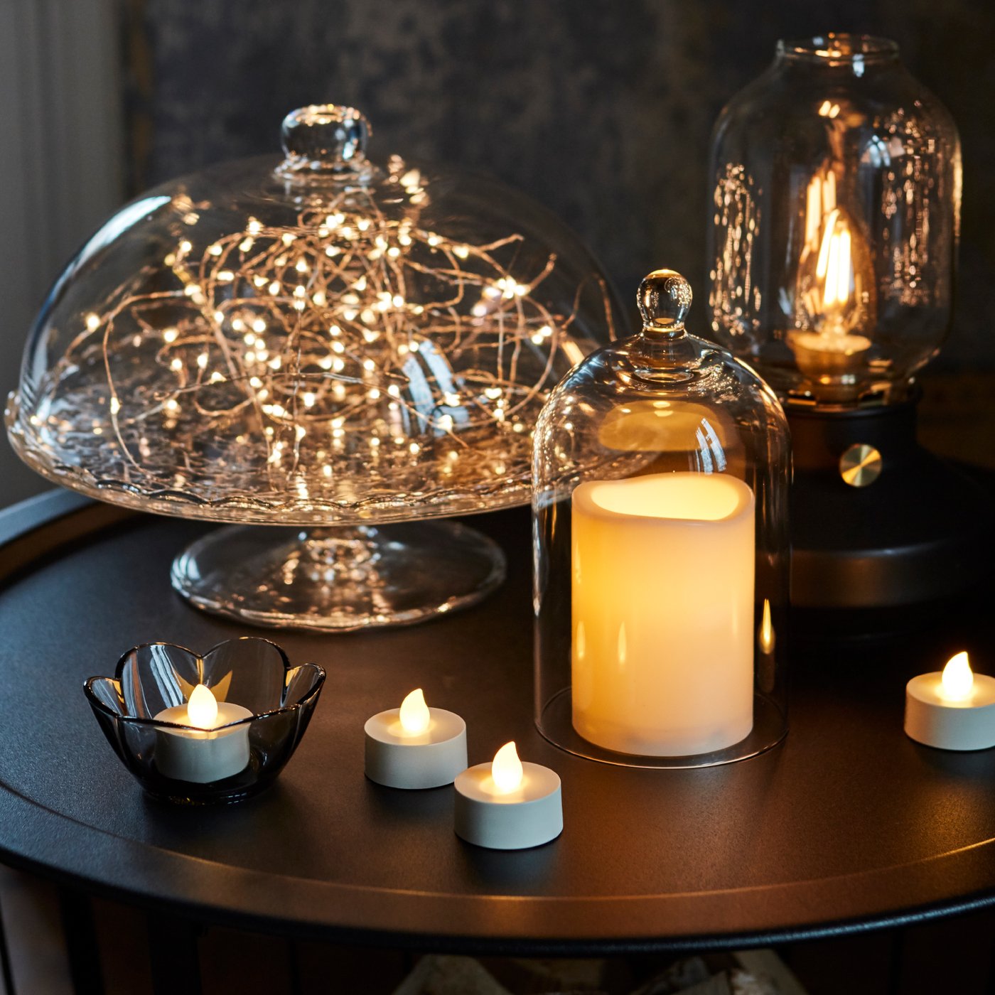 A battery-operated/natural GODAFTON LED tealight, in/outdoor in the living room