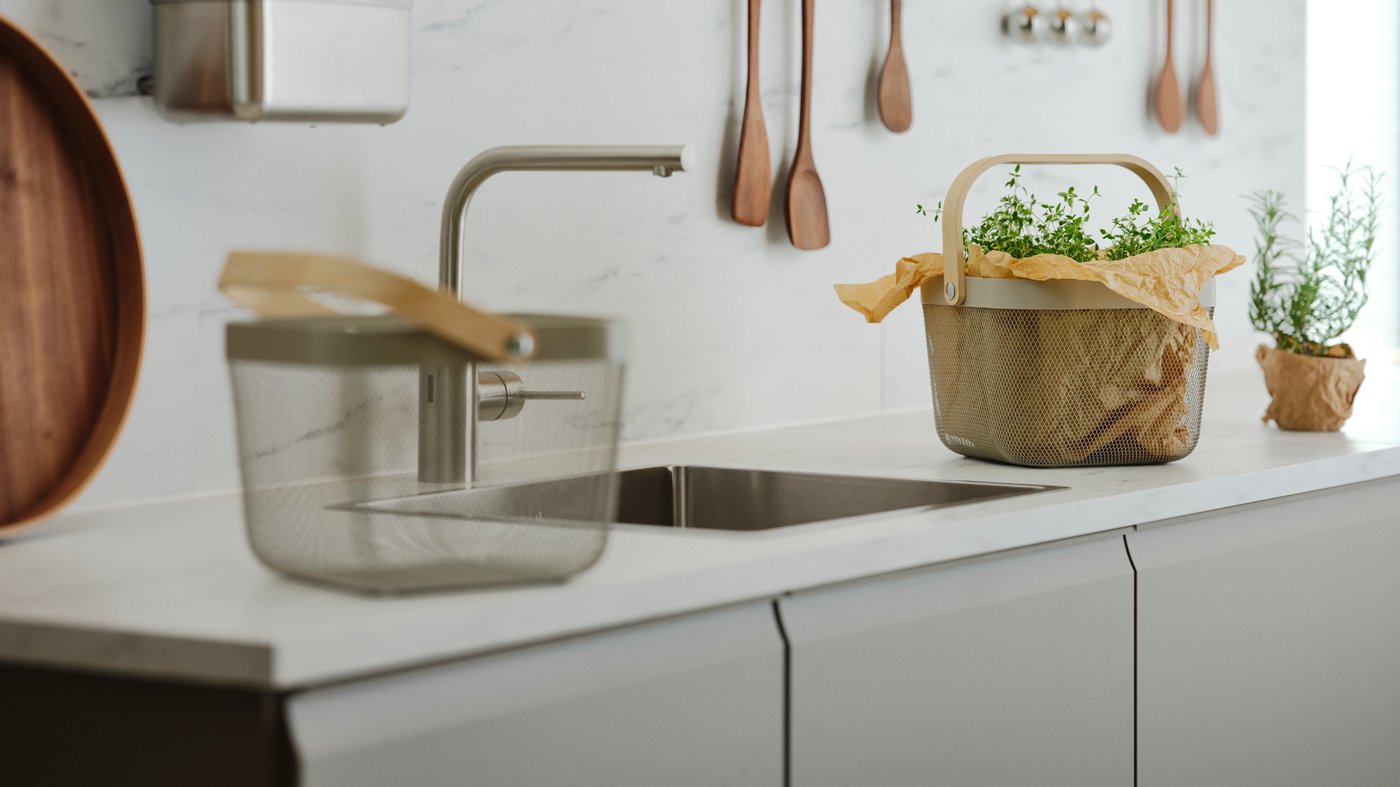 RISATORP basket with plants in a kitchen
