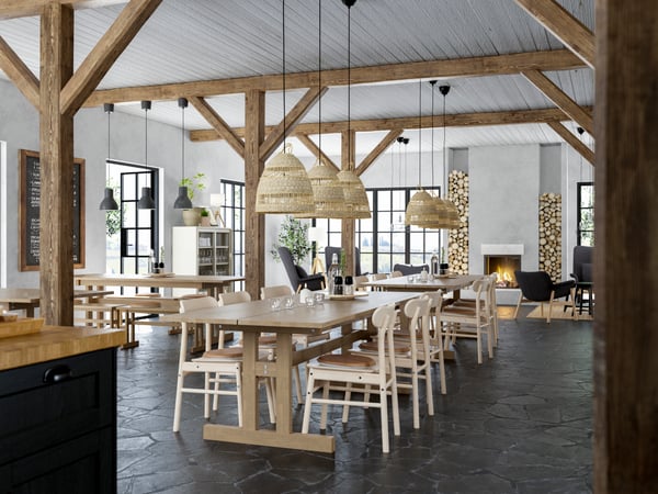 A birch RÖNNINGE chair at a RÖNNINGE dining table in a restaurant.