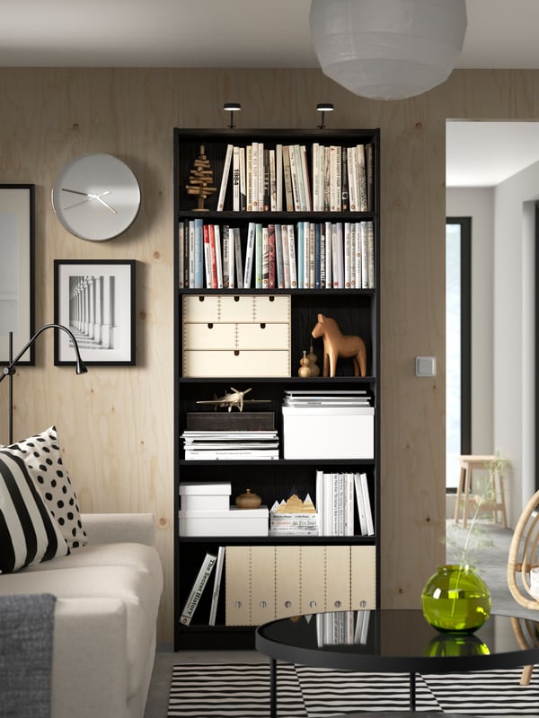 A black oak effect BILLY bookcase in the living room
