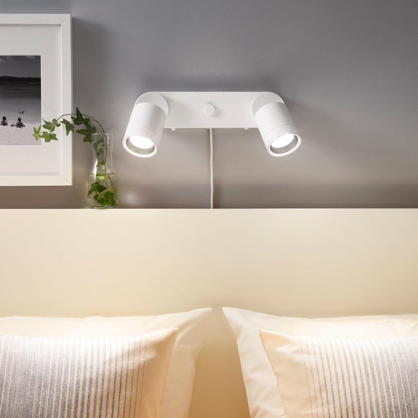 A white NYMÅNE wall lamp double