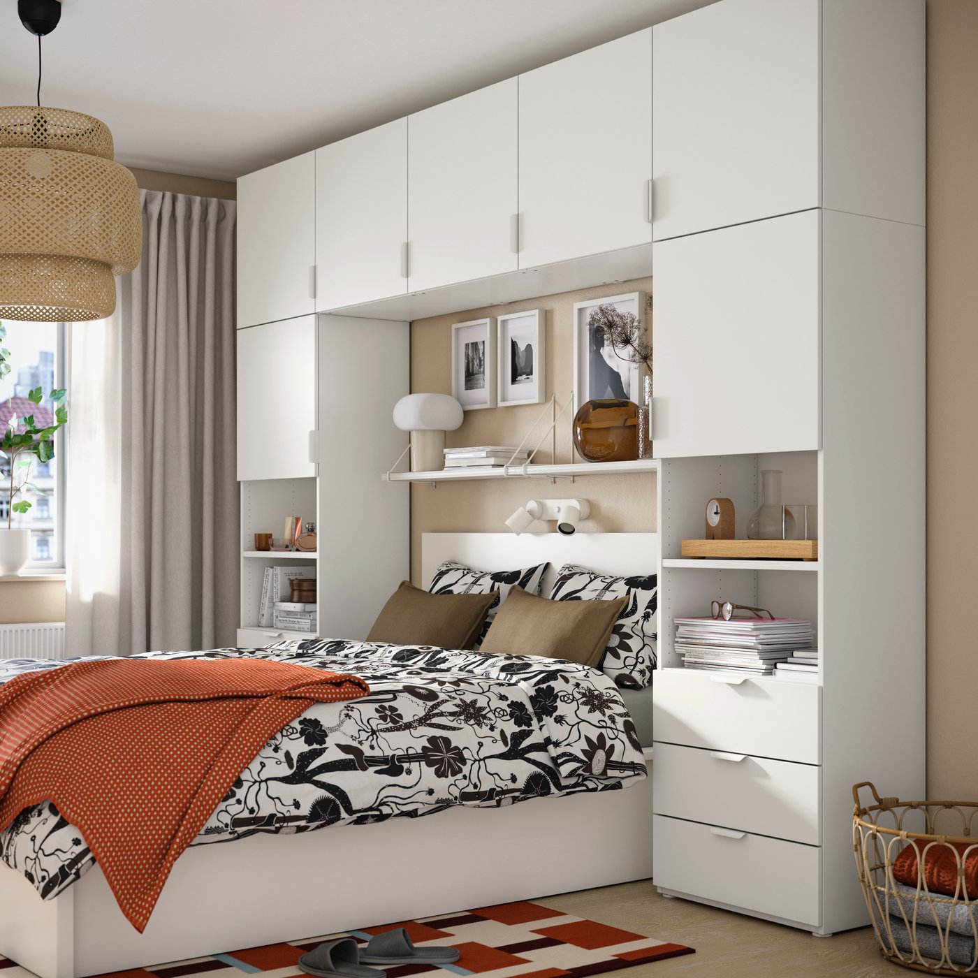 A white/Fonnes white PLATSA wardrobe with 7 doors+6 drawers in the bedroom