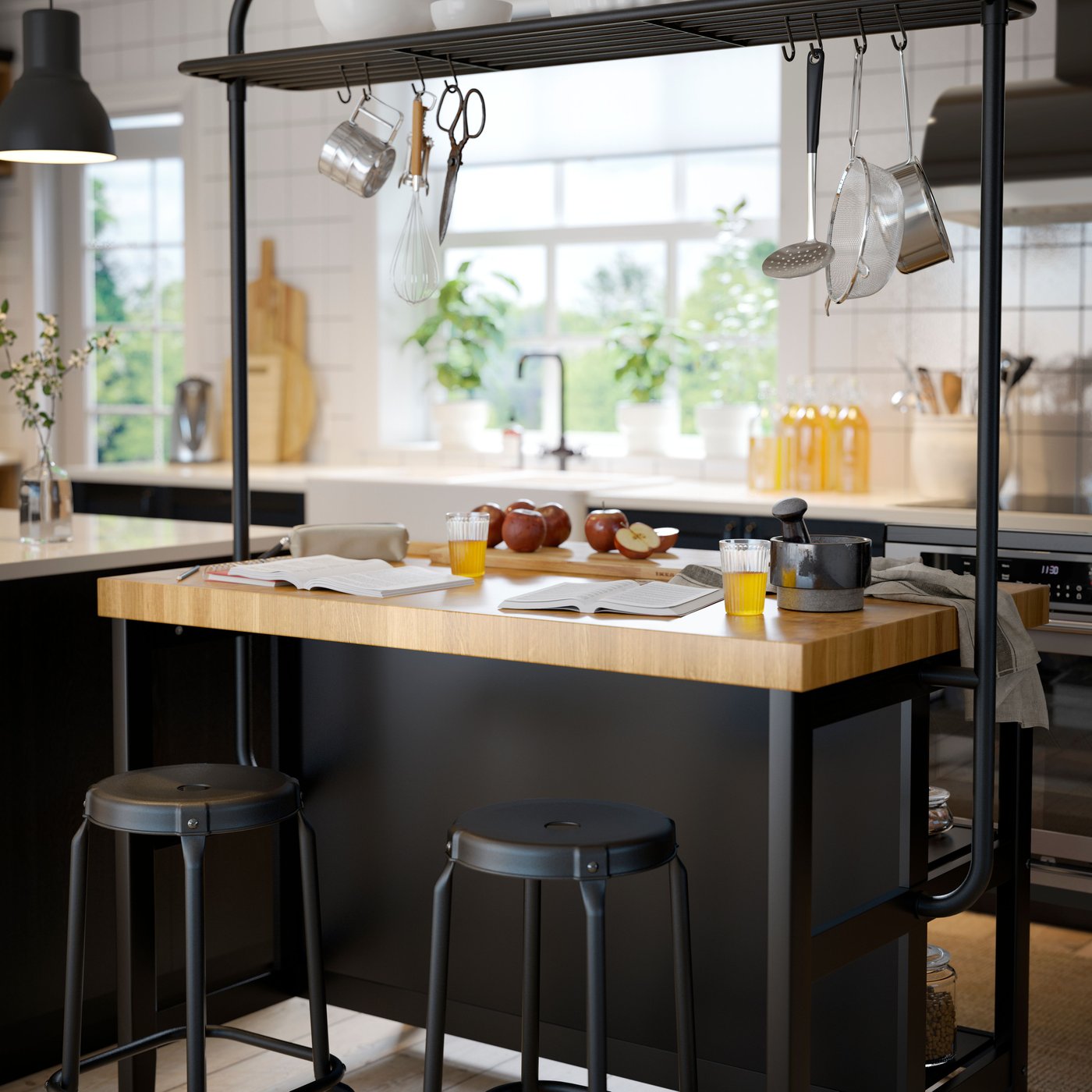 A black/oak VADHOLMA kitchen island