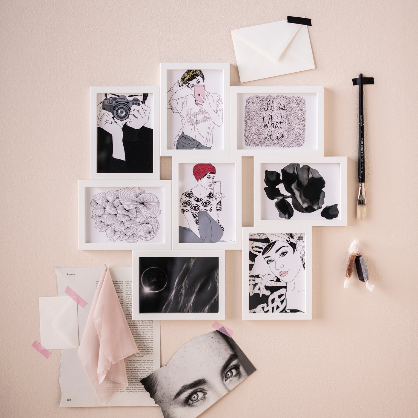 A white VÄXBO collage frame for 8 photos