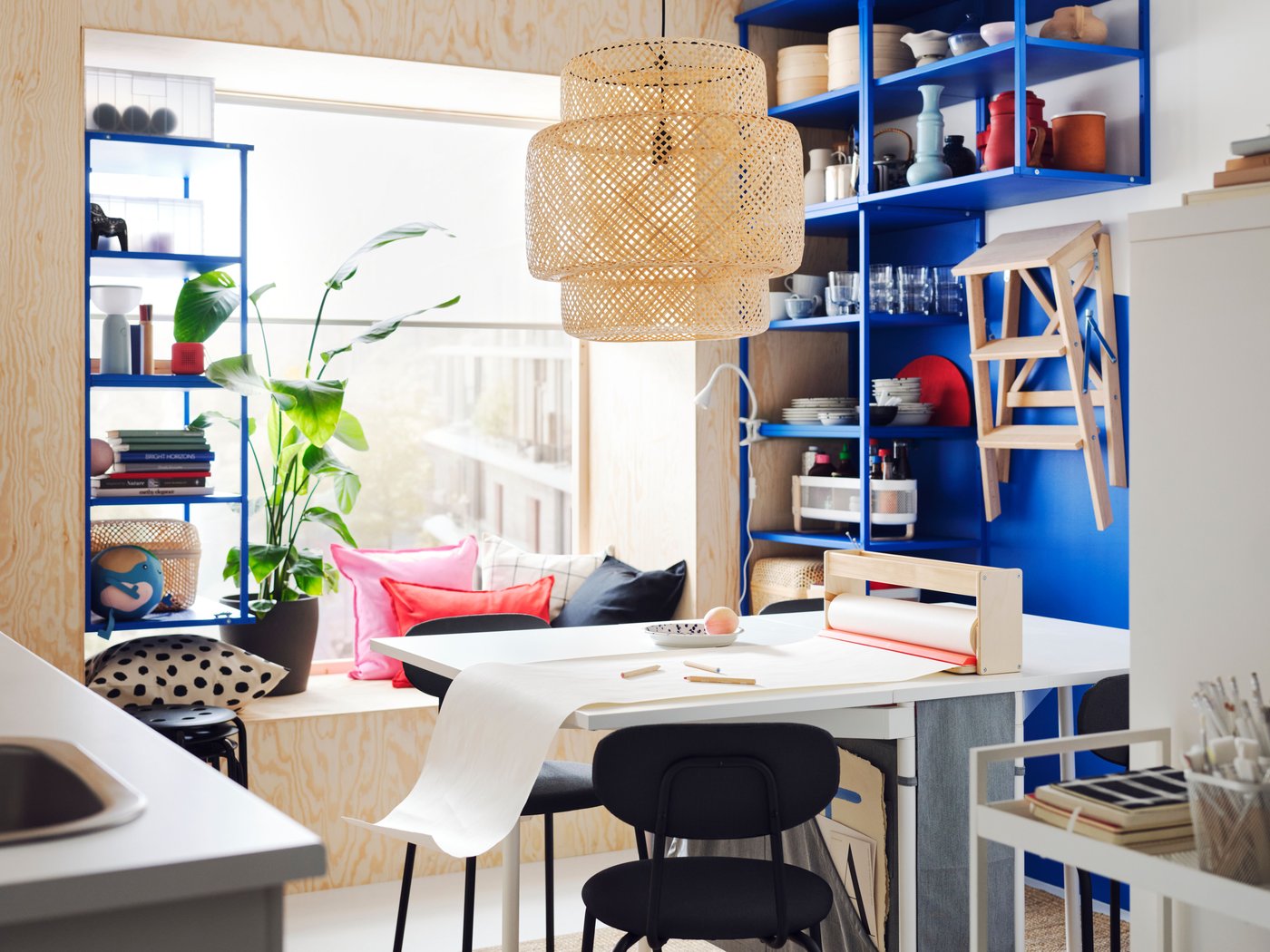 A blue PLATSA open shelving unit
