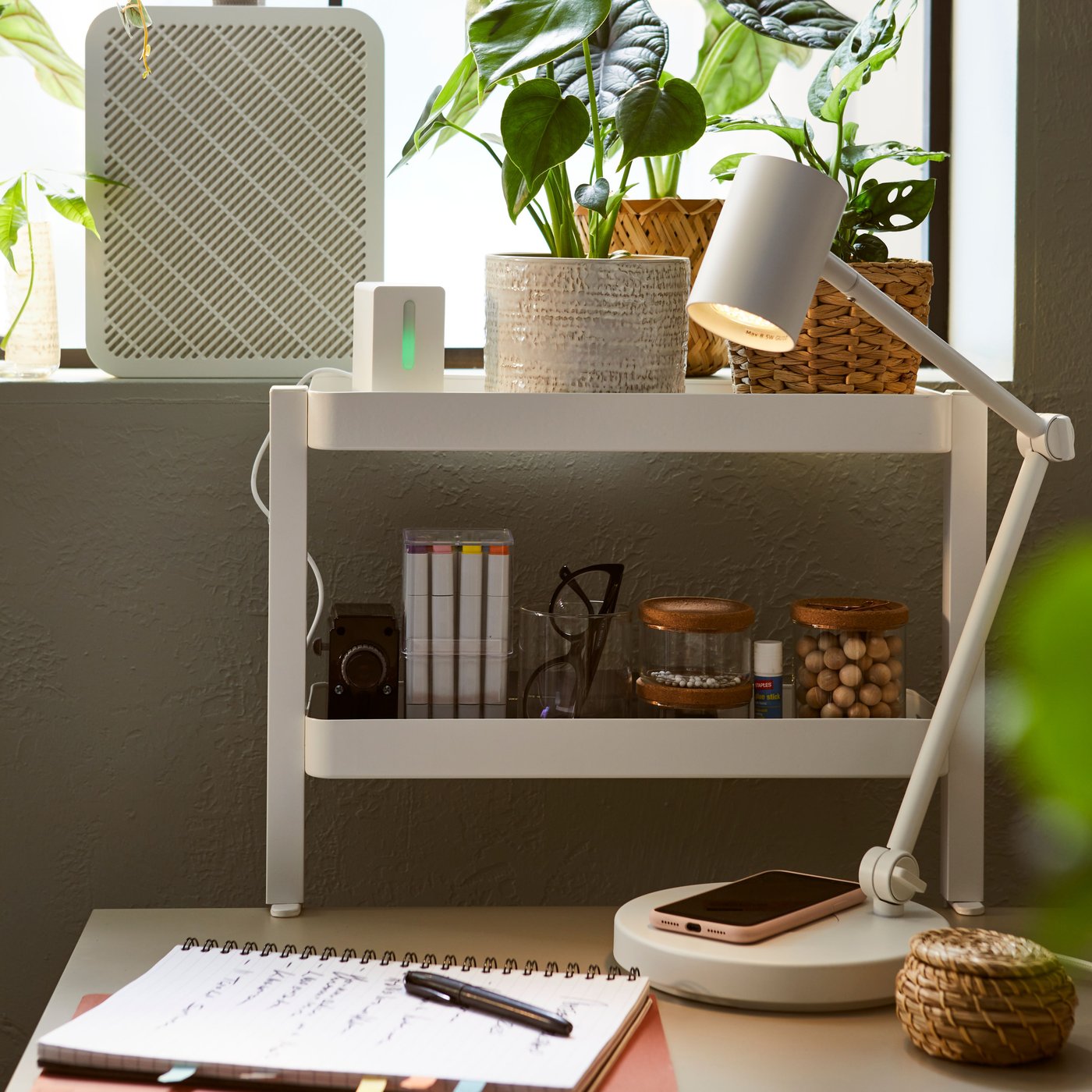 A white VATTENKAR desktop shelf
