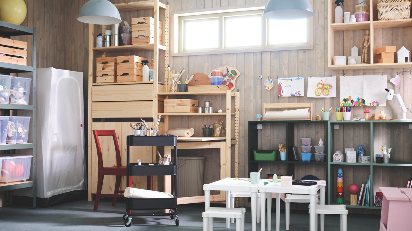 An in/outdoor/white UTTER children's table in the garage