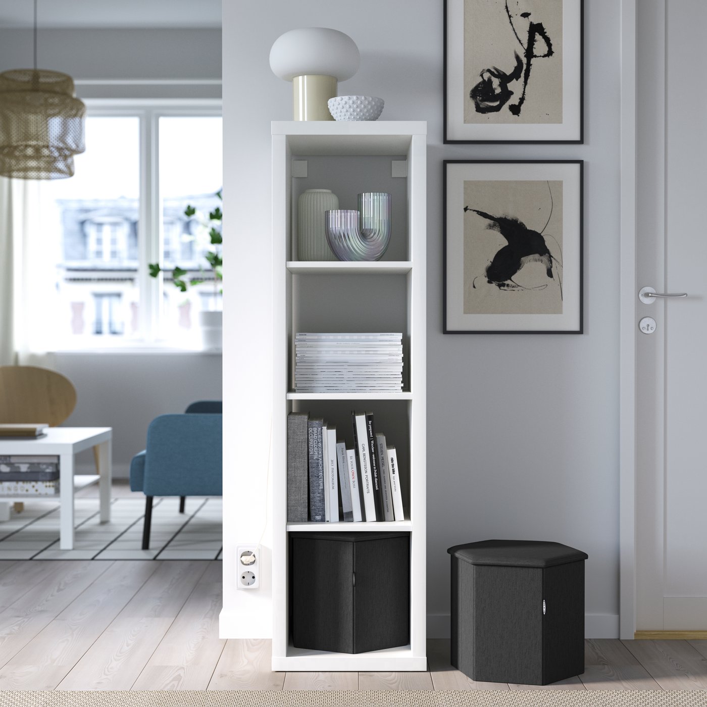 KJUGE footstool with storage that fits into a KALLAX unit.