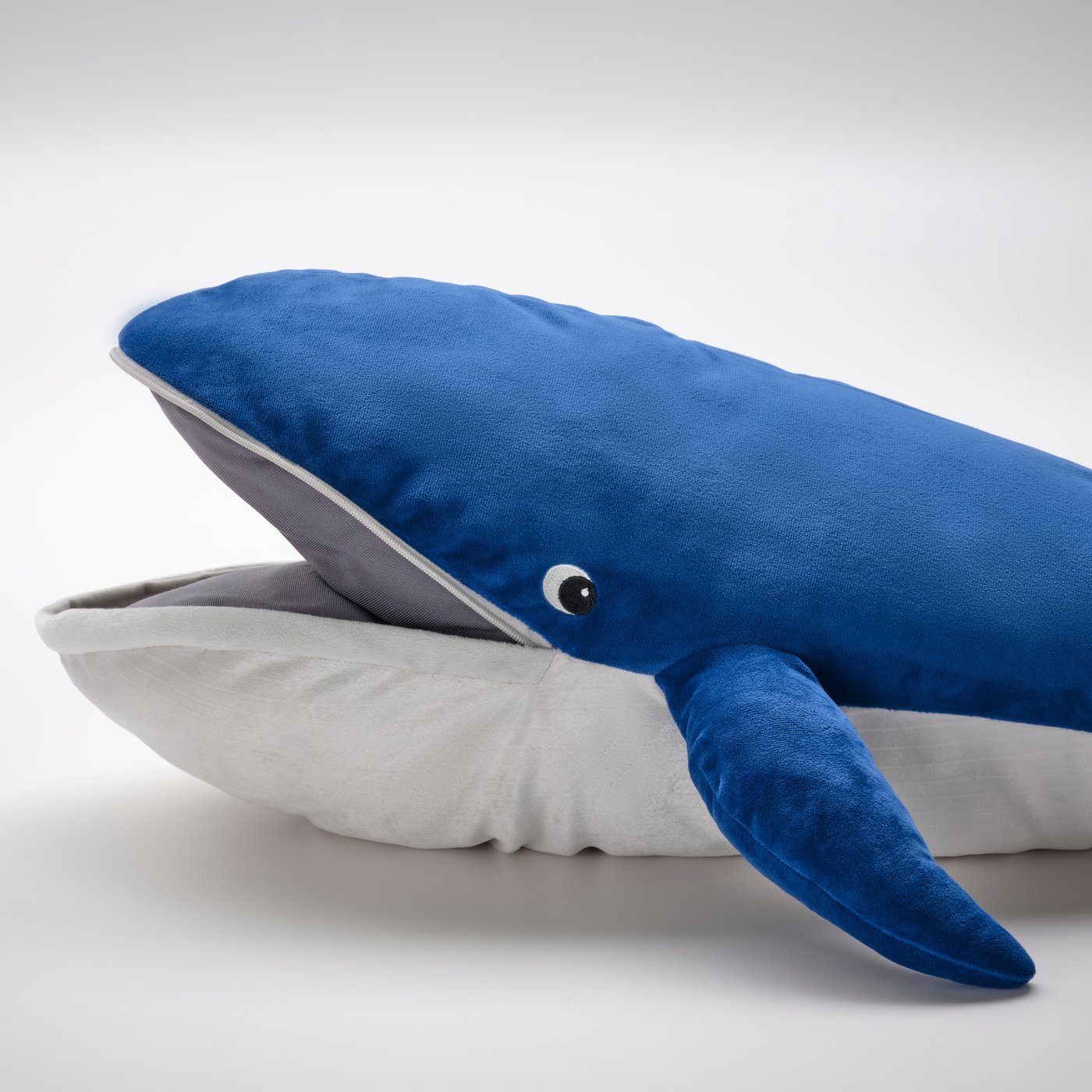 A blue whale BLÅVINGAD soft toy in the NA