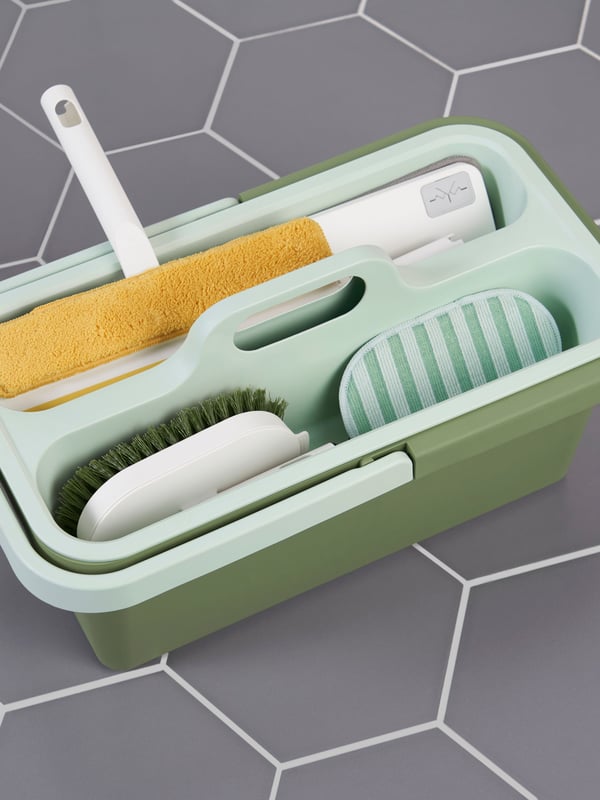 A green PEPPRIG cleaning bucket and caddy