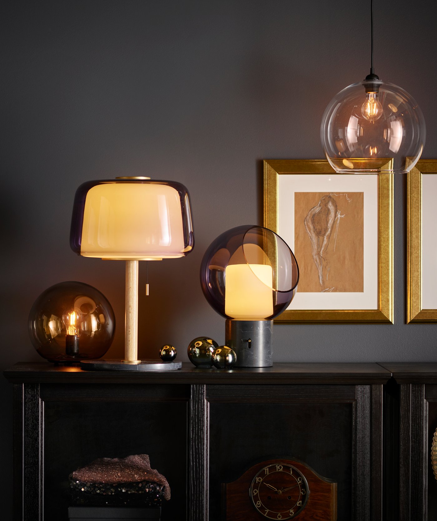 A marble/grey globe EVEDAL table lamp in the living room