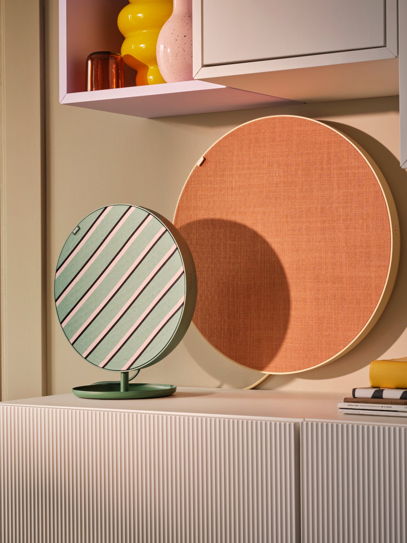 A green SOLSKYDD Bluetooth speaker