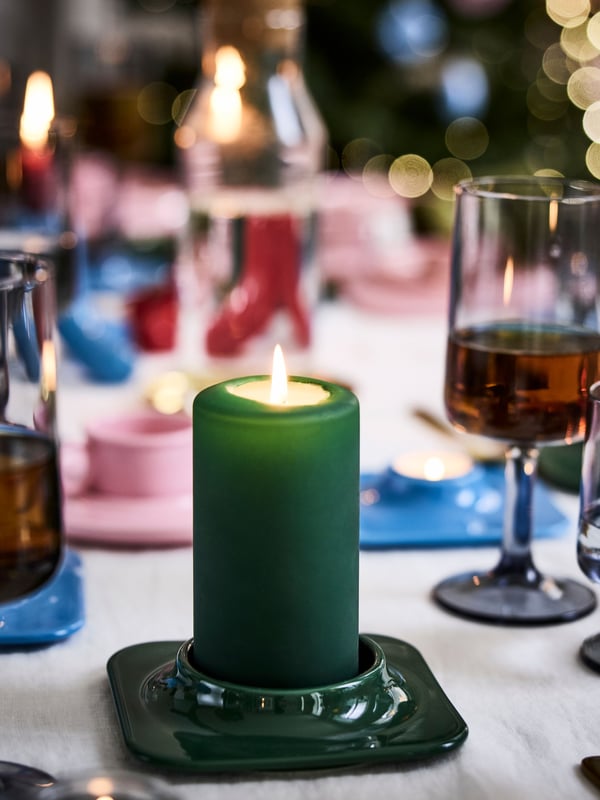 A dark green VINTERFINT pillar candle holder