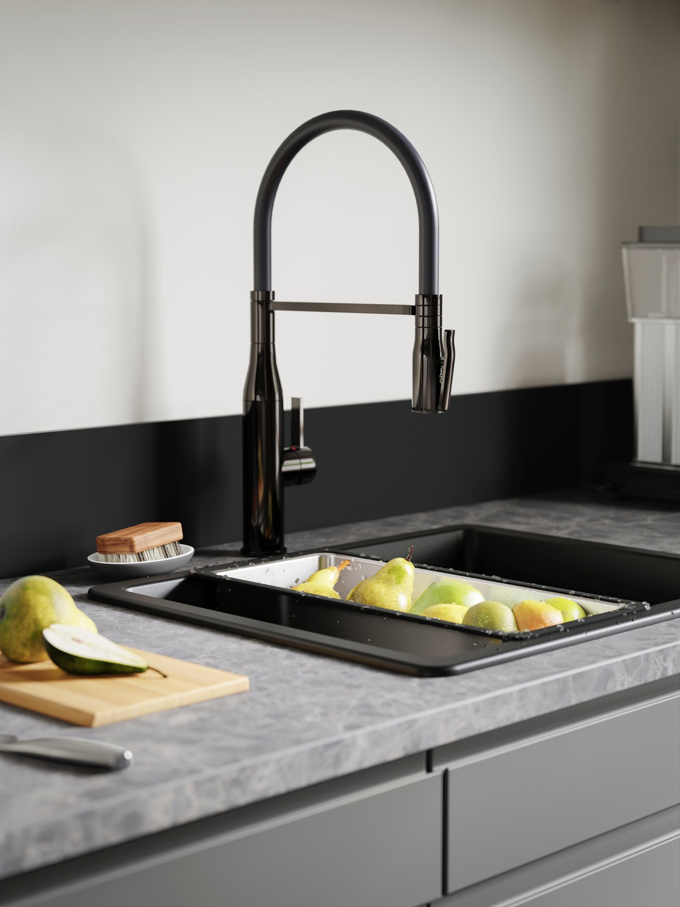 A black polished metal TOLLSJÖN kitchen mixer tap/handspray