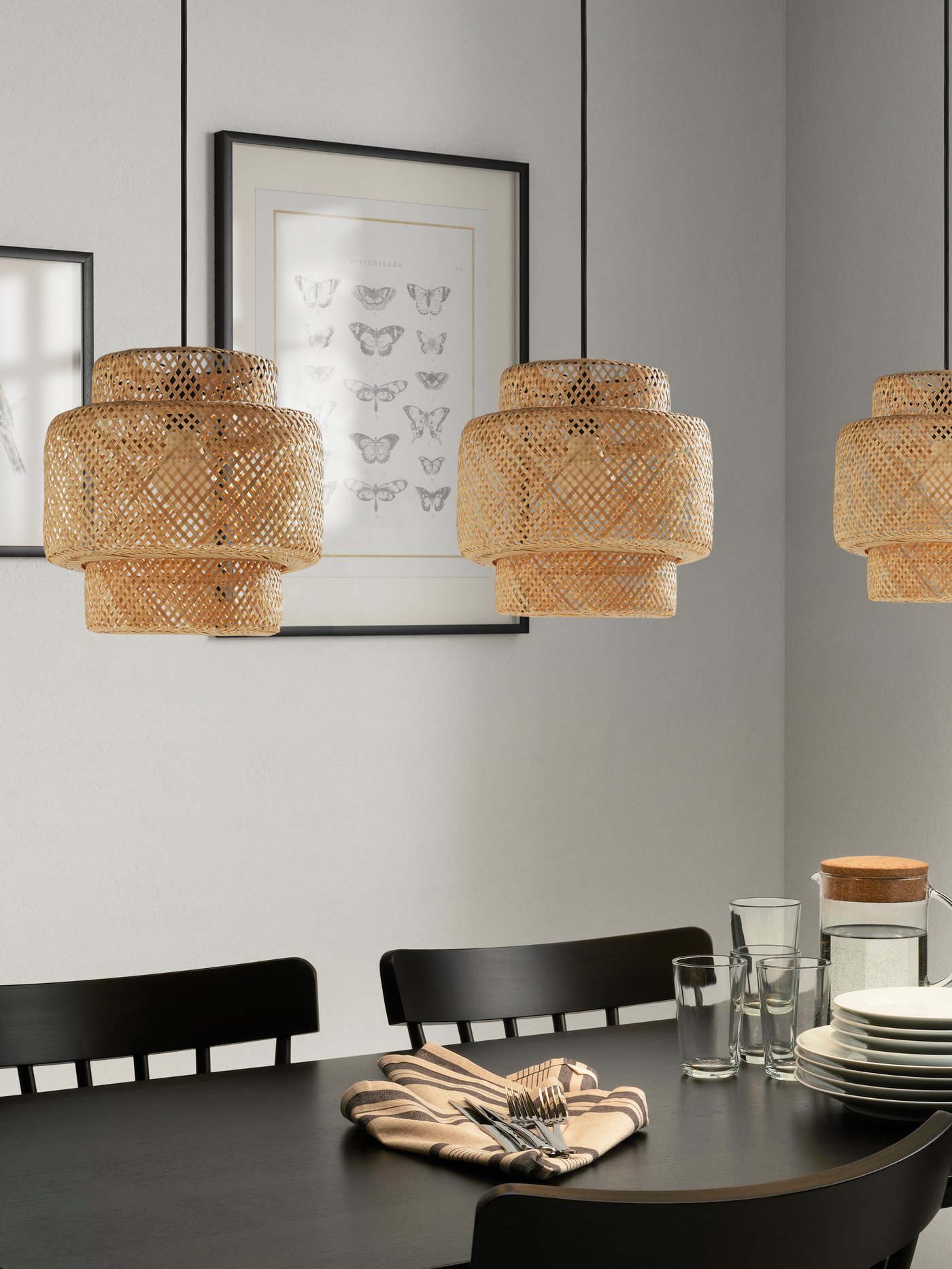 A bamboo/handmade SINNERLIG pendant lamp in the dining room