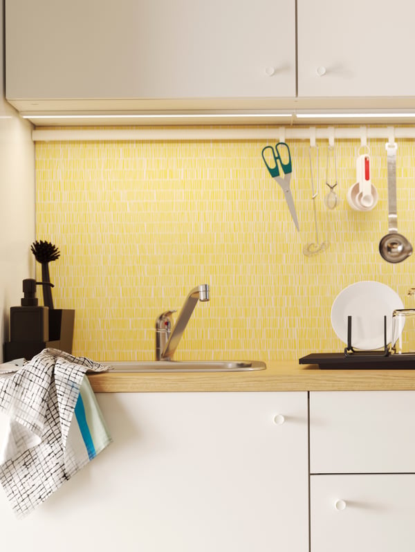 A RINNIG kitchen utensil rack in the kitchen