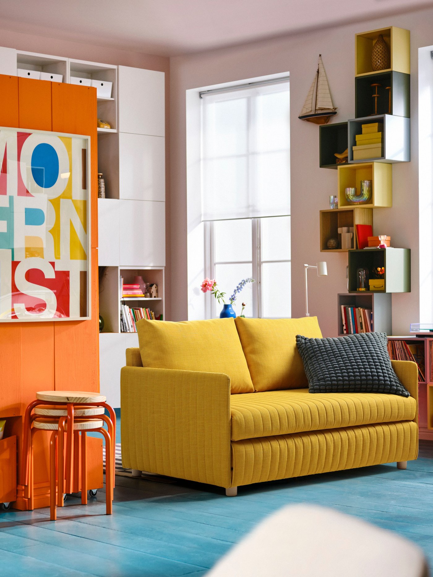 A Skiftebo yellow FRIDHULT sofa-bed