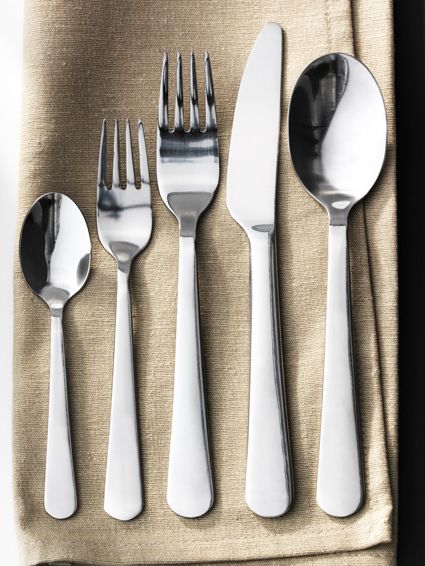A stainless steel DRAGON 60-piece cutlery set in the NA
