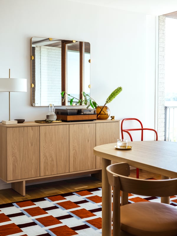 A brass-colour STOCKHOLM 2025 bowl and dish in the living room