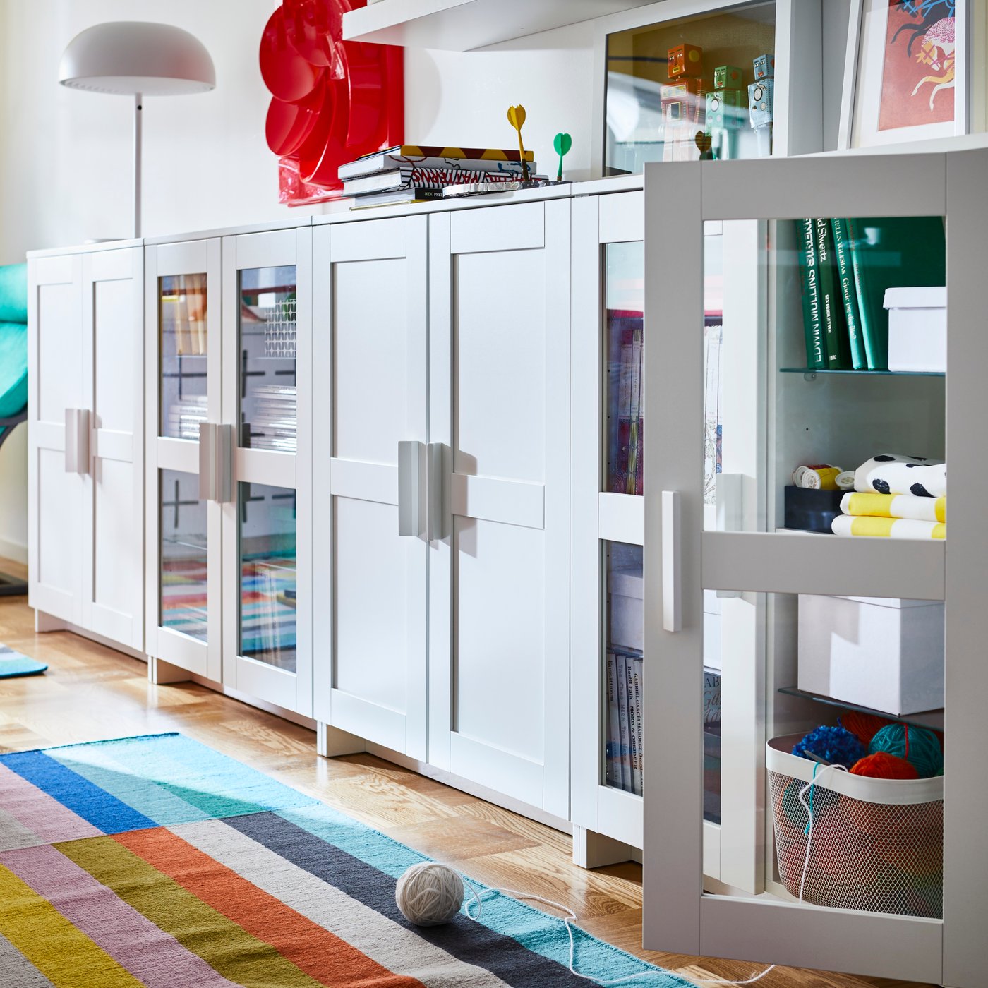 A white BRIMNES cabinet with doors in the living room