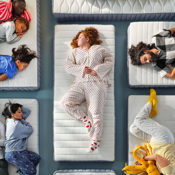 A firm/light blue VALEVÅG pocket sprung mattress in the NA