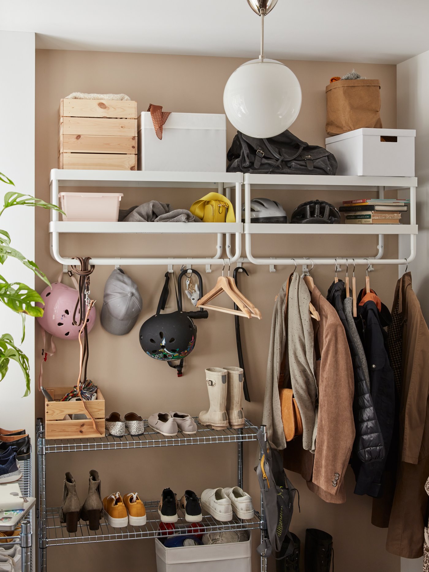A white MACKAPÄR hat and coat rack in the hallway