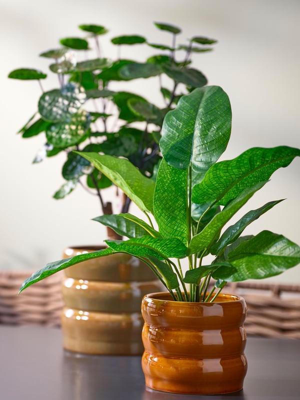 An in/outdoor/beige HASSELBUKETT plant pot
