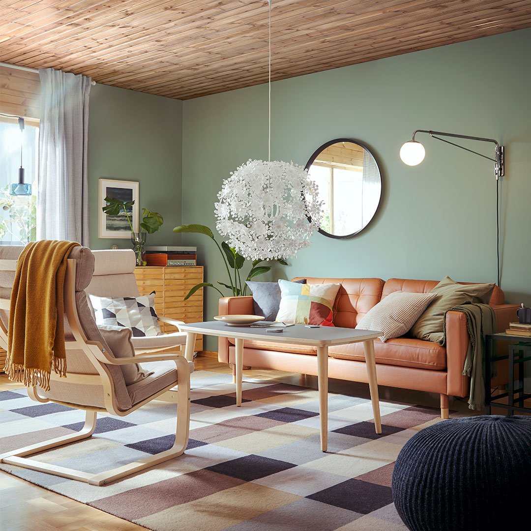 A Grann/Bomstad golden-brown/wood LANDSKRONA 3-seat sofa in the living room