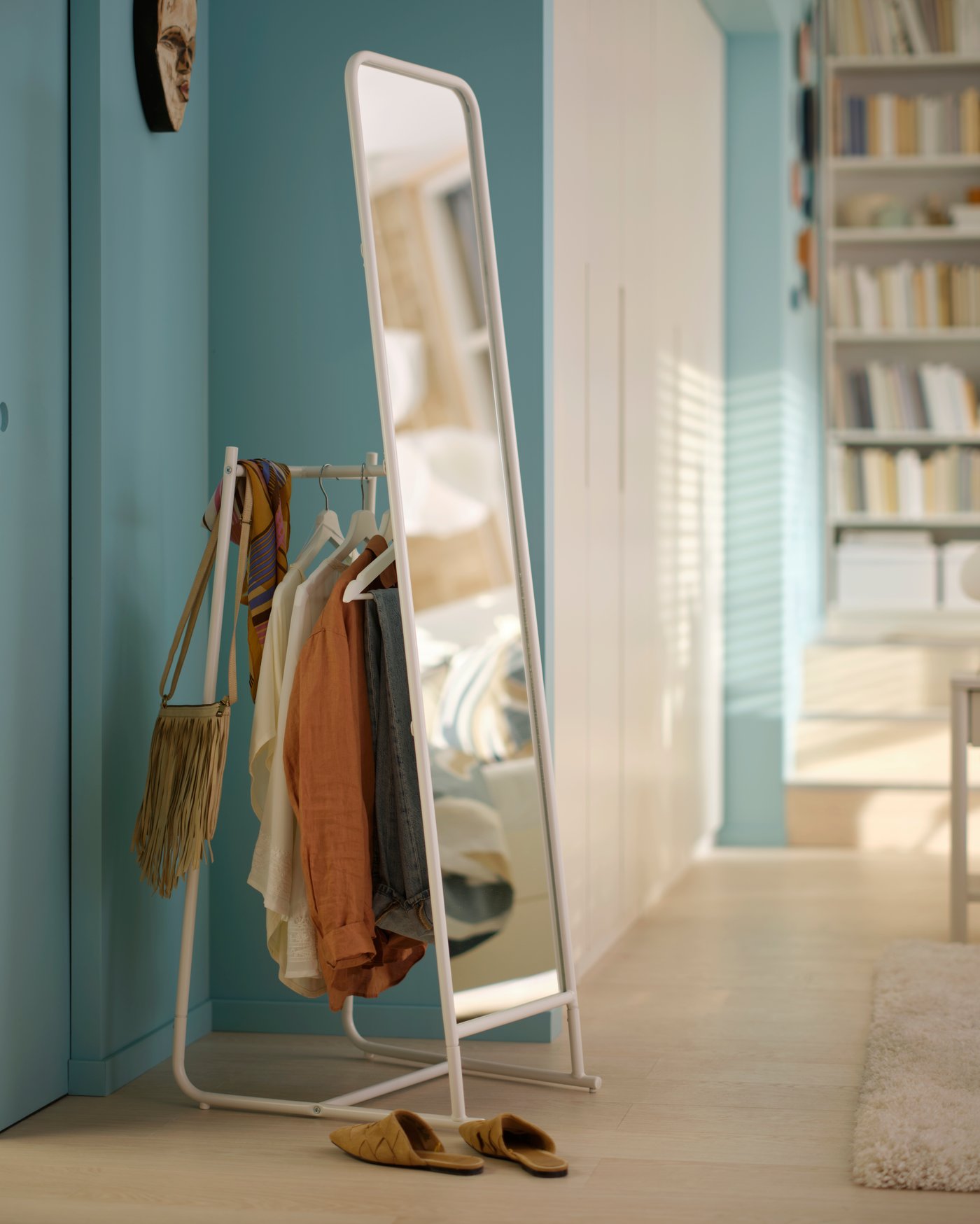 A white BUMERANG hanger in the bedroom