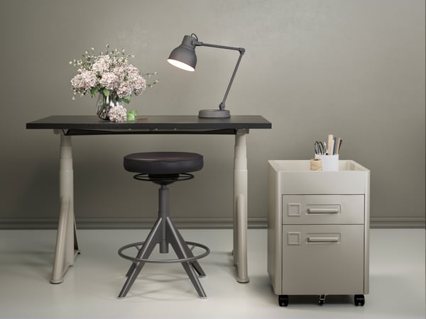 A beige IDÅSEN drawer unit on castors in the home office