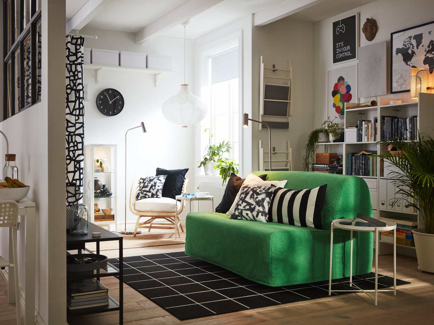 A white/black TURILL cushion in the living room