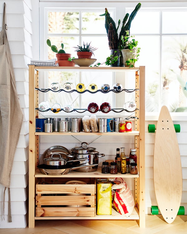 A pine IVAR shelf in the kitchen