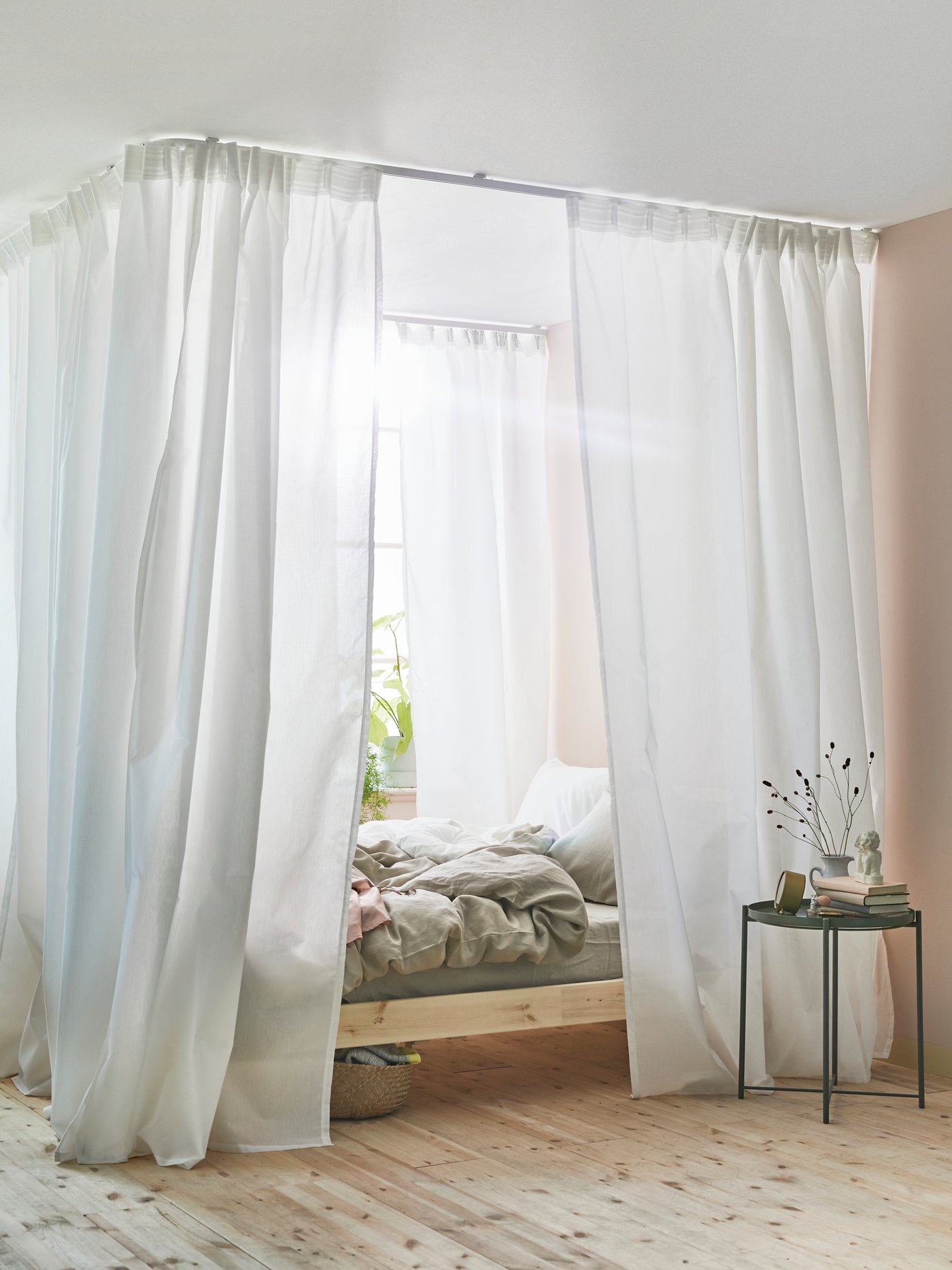 A dark green GLADOM tray table in the bedroom