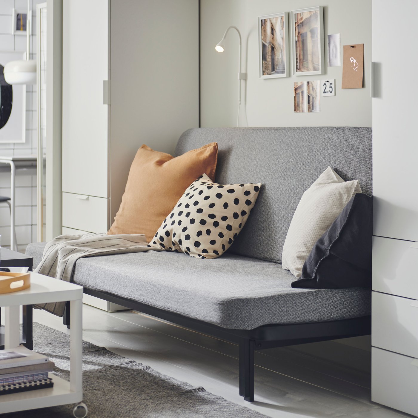 A dark beige DYTÅG cushion cover in the living room