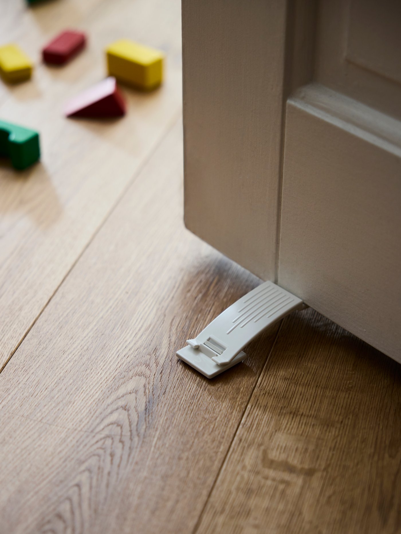 A white PATRULL door stop
