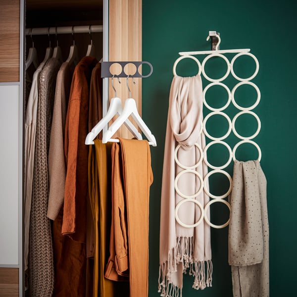 A white BUMERANG hanger in the bedroom