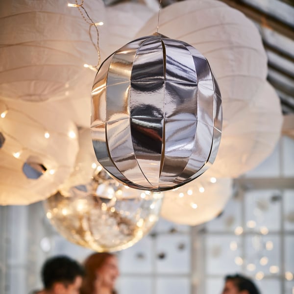 A chrome effect FRÖJDA hanging decoration