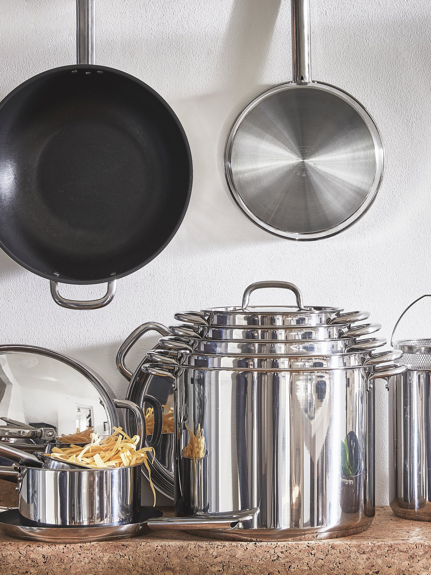 A stainless steel IKEA 365+ pot with lid